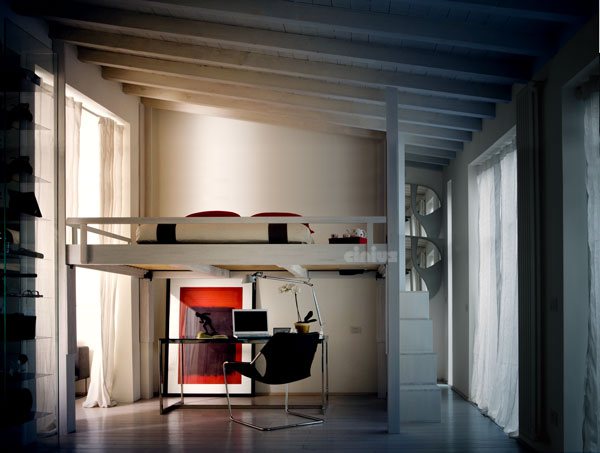 The same Rising lowered above the desk